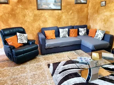 Coin salon dans l'établissement Maison confortable à Ver-sur-Mer avec jardin privé