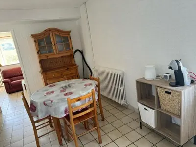 Cuisine ou kitchenette dans l'établissement Appartement OMAHA BEACH