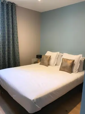 Un ou plusieurs lits dans un hébergement de l'établissement Villa st Louis