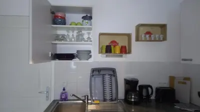 Cuisine ou kitchenette dans l'établissement Chalet Les dauphins