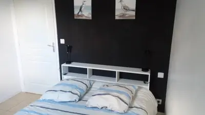 Un ou plusieurs lits dans un hébergement de l'établissement Chalet Les dauphins