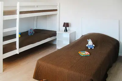 Un ou plusieurs lits dans un hébergement de l'établissement Apartment in Grandcamp for 4 Person