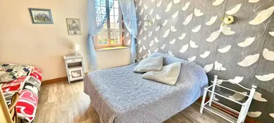 Un ou plusieurs lits dans un hébergement de l'établissement La Chevrie