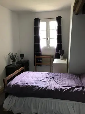 Un ou plusieurs lits dans un hébergement de l'établissement Lavender Cottage