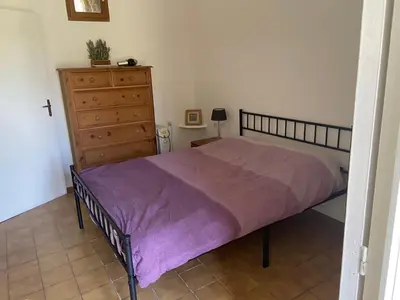 Un ou plusieurs lits dans un hébergement de l'établissement Lavender Cottage