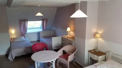 Un ou plusieurs lits dans un hébergement de l'établissement Chambres d'Hôtes Côté Campagne