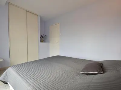 Un ou plusieurs lits dans un hébergement de l'établissement Family Stay in Normandy