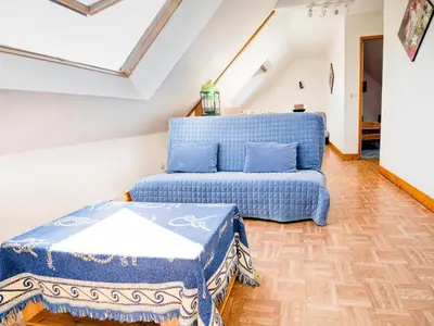 Coin salon dans l'établissement Apartment in Saint-Rémy near Lake