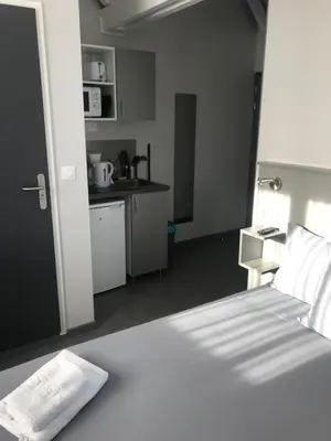 Cuisine ou kitchenette dans l'établissement Smart Appart Caen République