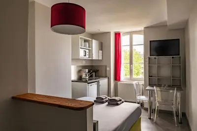 Cuisine ou kitchenette dans l'établissement Smart Appart Caen République