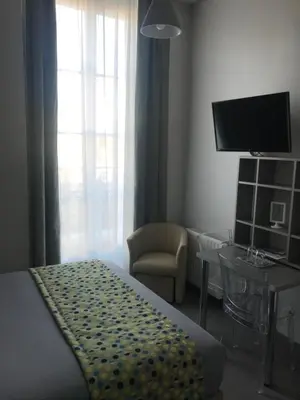 Télévision ou salle de divertissement dans l'établissement Smart Appart Caen République