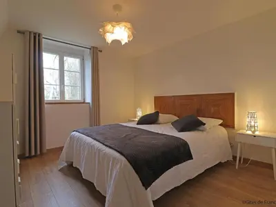 Un ou plusieurs lits dans un hébergement de l'établissement Gîte confortable avec animaux, jardin et wifi inclus, cadre paisible en Normandie - FR-1-497-6