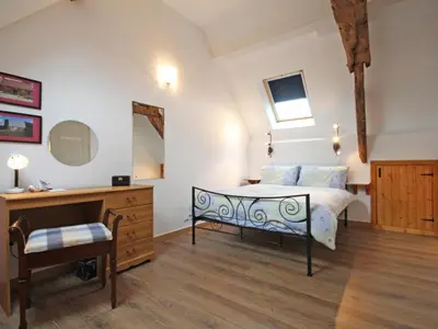 Un ou plusieurs lits dans un hébergement de l'établissement Grange restaurée avec jardin, animaux acceptés, WiFi inclus - FR-1-497-63