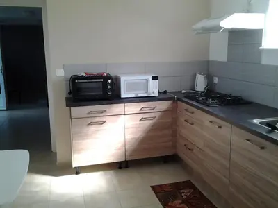 Cuisine ou kitchenette dans l'établissement Chez Julien