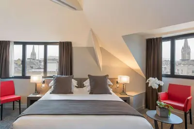 Un ou plusieurs lits dans un hébergement de l'établissement Best Western Plus Le Moderne