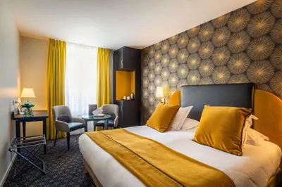 Un ou plusieurs lits dans un hébergement de l'établissement Best Western Plus Le Moderne