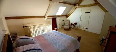 Un ou plusieurs lits dans un hébergement de l'établissement L' Anpeg, gîte dans le Cotentin jusqu'à 8 personnes