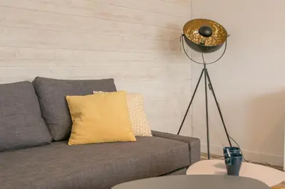 Coin salon dans l'établissement APPARTEMENT MODERNE A CAEN POUR 4 PERSONNES