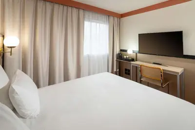Un ou plusieurs lits dans un hébergement de l'établissement Sure Hotel by Best Western Caen Memorial