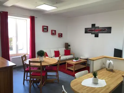 Coin salon dans l'établissement APPT 1.5KM PLAGES DU DÉBARQUEMENT