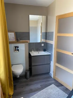 Salle de bains dans l'établissement Au Rythme des Vagues