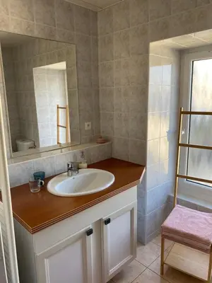 Salle de bains dans l'établissement Au Rythme des Vagues