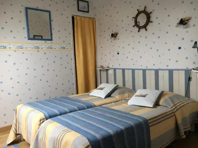 Un ou plusieurs lits dans un hébergement de l'établissement La Maison s'apelle le P'tit Nid