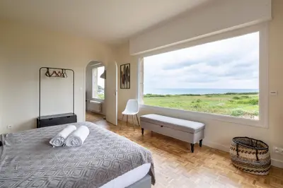Un ou plusieurs lits dans un hébergement de l'établissement Le Sémaphore - Maison avec sauna vue mer