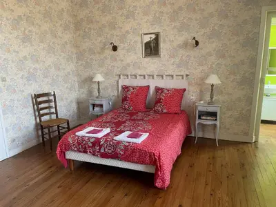 Un ou plusieurs lits dans un hébergement de l'établissement B&B Chambres d'hôtes Ferme Mahyas