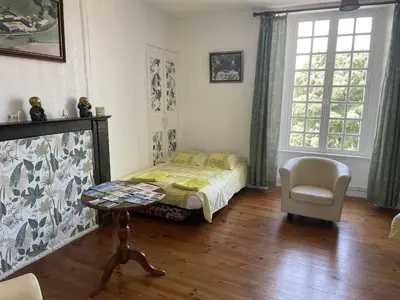 Un ou plusieurs lits dans un hébergement de l'établissement B&B Chambres d'hôtes Ferme Mahyas