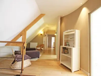 Coin salon dans l'établissement Gîte familial 12 pers., animaux acceptés, à l'orée de la forêt - FR-1-497-18