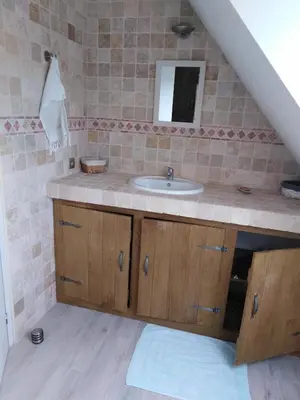 Salle de bains dans l'établissement L'Tas De Cailloux
