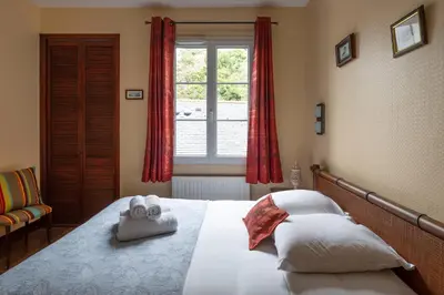 Un ou plusieurs lits dans un hébergement de l'établissement La Bisquine - Appt pour 4 avec vue mer