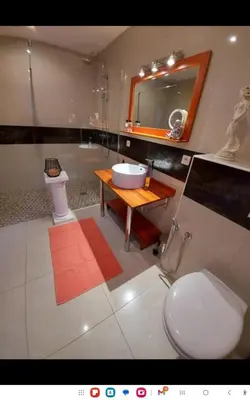 Salle de bains dans l'établissement Les Suites de Véronique, chez Véronique Olive