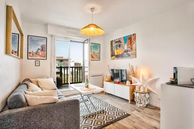 Coin salon dans l'établissement Plage Cabourg 7bis