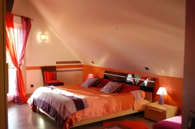Un ou plusieurs lits dans un hébergement de l'établissement Le Clos des Pommiers, chambres d'hôtes & Spa