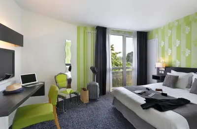 Un ou plusieurs lits dans un hébergement de l'établissement Altos Hotel & Spa