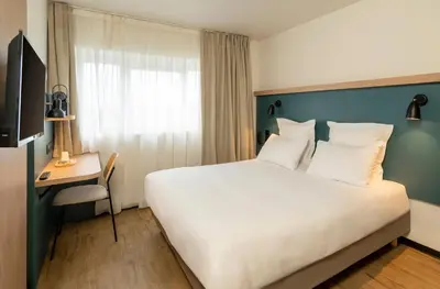 Un ou plusieurs lits dans un hébergement de l'établissement Le Carline, Sure Hotel Collection by Best Western