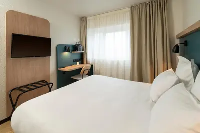 Un ou plusieurs lits dans un hébergement de l'établissement Le Carline, Sure Hotel Collection by Best Western