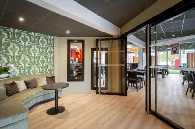 Coin salon dans l'établissement Zenith Hotel Caen