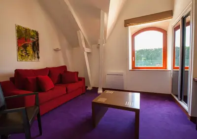 Coin salon dans l'établissement Château de Bellefontaine - Teritoria