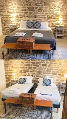 Un ou plusieurs lits dans un hébergement de l'établissement La Maison Gavraise