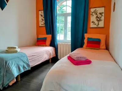 Un ou plusieurs lits dans un hébergement de l'établissement kerwatt - Grande et belle maison de ville avec jardin, proche centre et mer