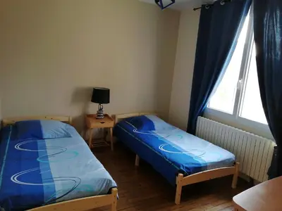 Un ou plusieurs lits dans un hébergement de l'établissement Le Lutice