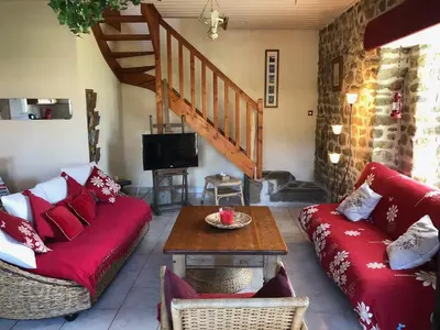 Coin salon dans l'établissement Proche Mont St-Michel, deux maisons authentiques au cœur de la nature, domaine de l'Angevinière
