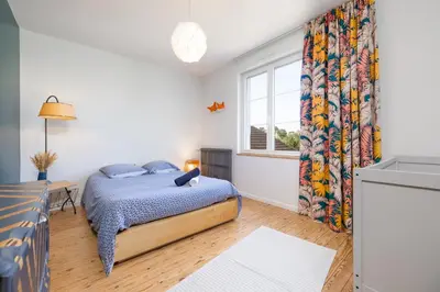 Un ou plusieurs lits dans un hébergement de l'établissement CHEZDAMDAM - la Villa du Thar - plage 300m piscine babyfoot arcade pingpong pétanque