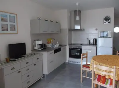 Cuisine ou kitchenette dans l'établissement villa marine 2