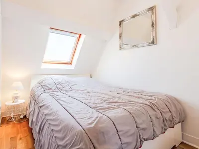 Un ou plusieurs lits dans un hébergement de l'établissement Apartment Marie Antoinette-2 by Interhome