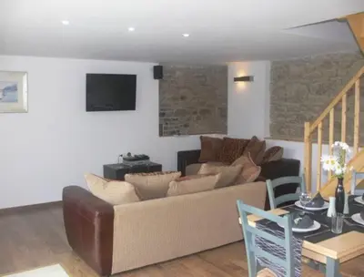 Coin salon dans l'établissement Le Jardin B&B