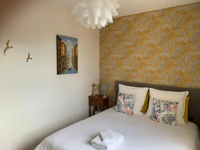 Un ou plusieurs lits dans un hébergement de l'établissement VILLA CATHY Chambres d hôtes